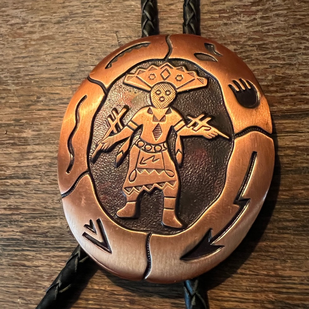 Copper Kokopelli dancer Bolo tie.
